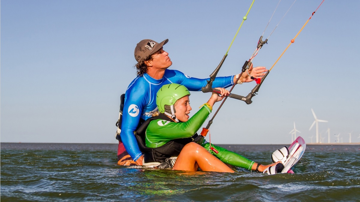 Kitesurf instructor and student flying a kite